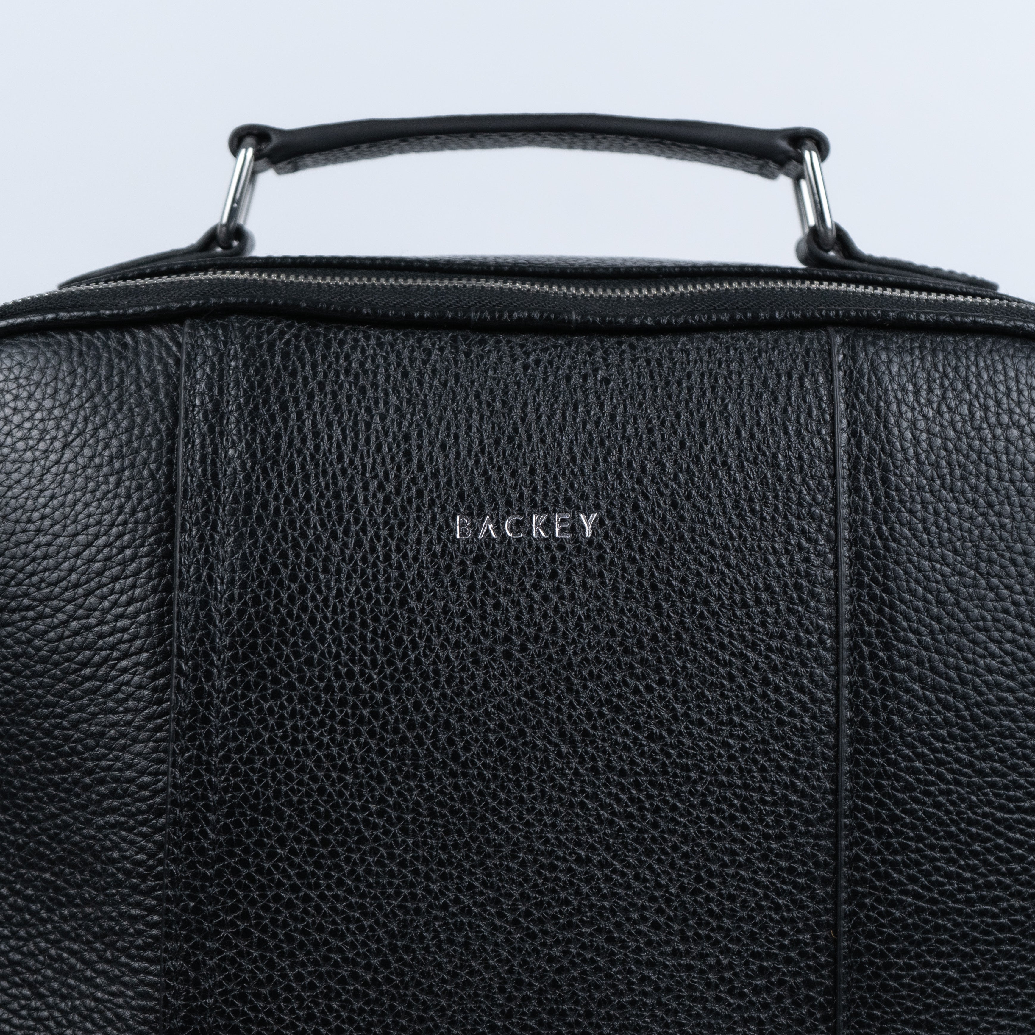 Minimal leather handle of Backey Backpack